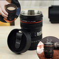 Camera EF24‑105mm coffee lens mug with lid on table